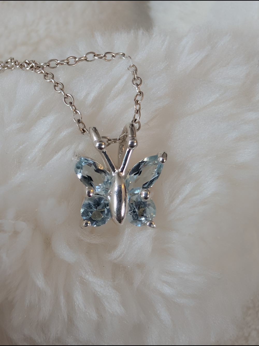 Silver Butterfly Necklace with Light Blue Gemstones
